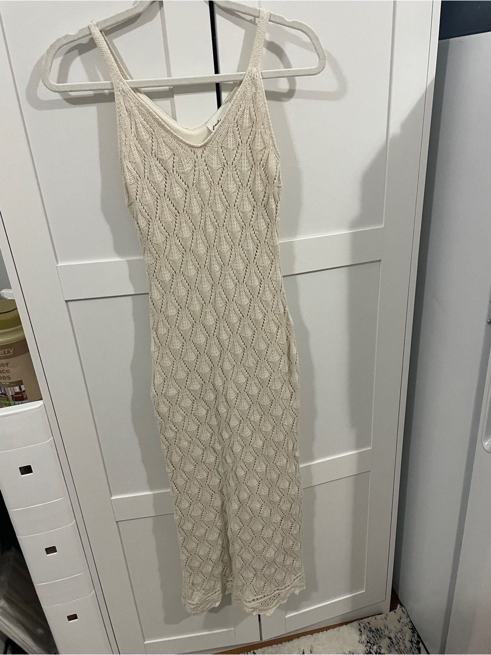 Freshman Cream Knit V‑Neck Sleeveless Jumpsuit